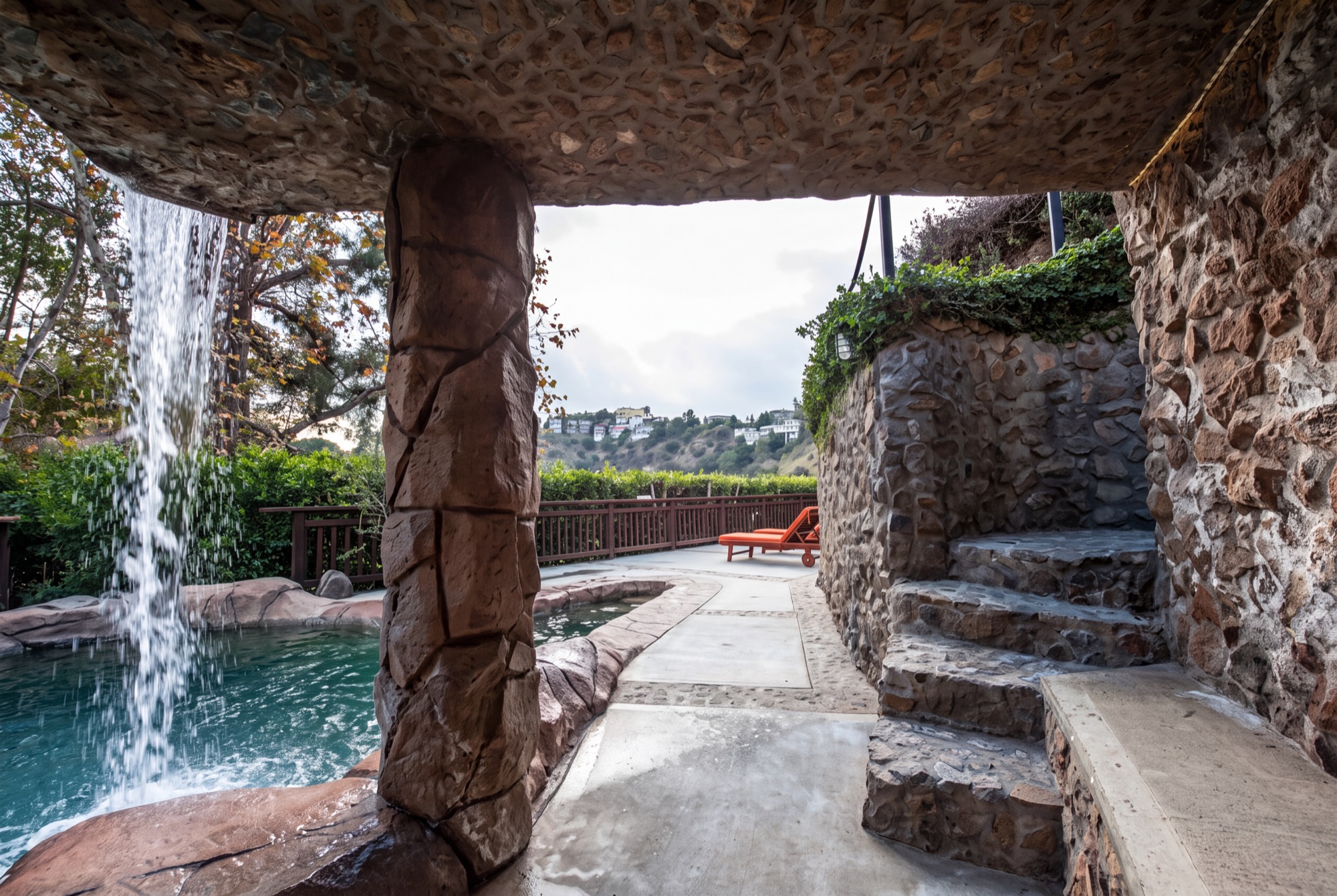 Covered stone grotto overlooking the canyon