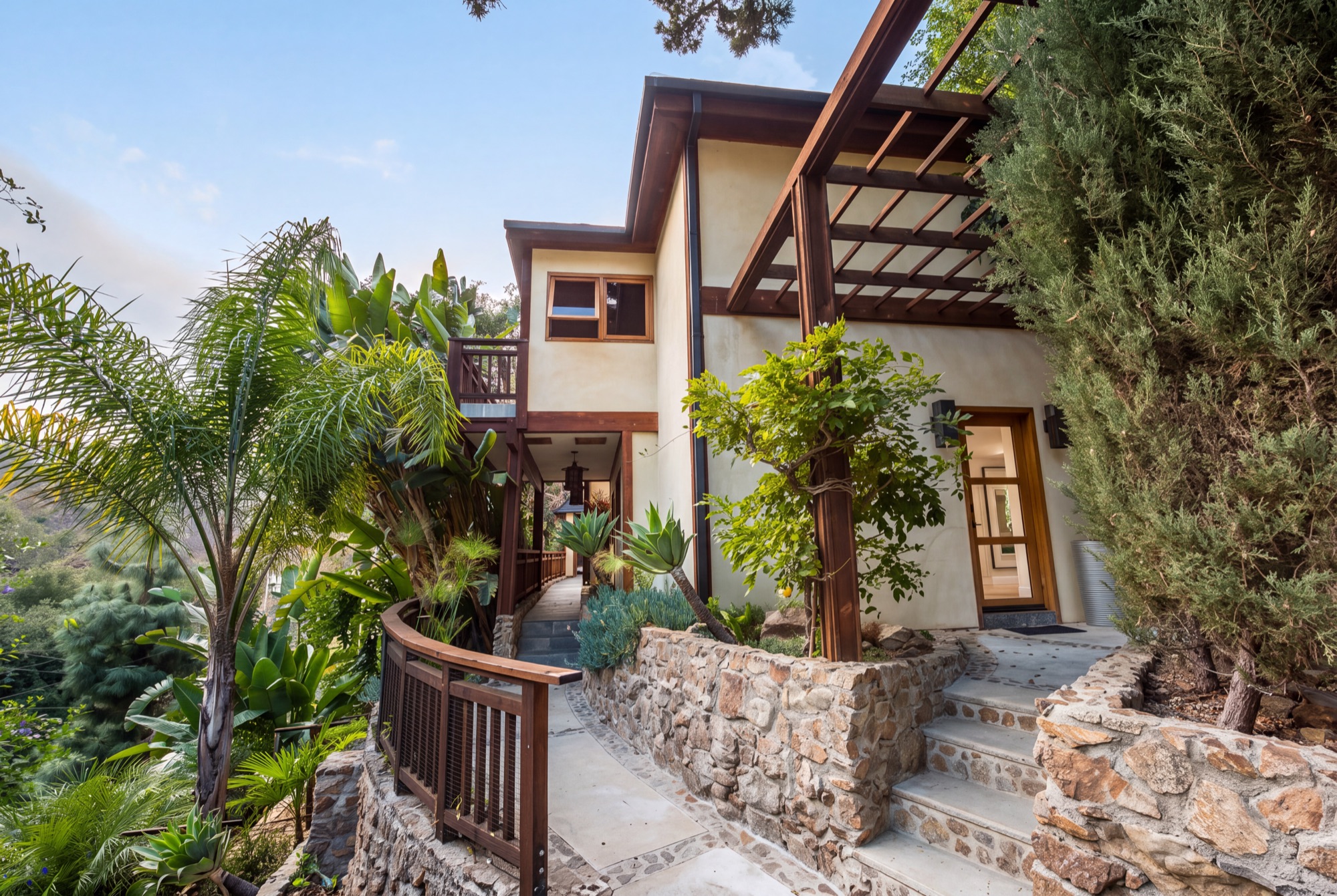 Stone steps through lush garden landscaping